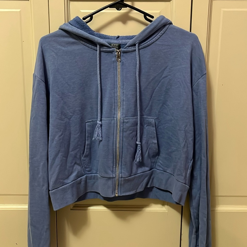 cropped blue zip up jacket